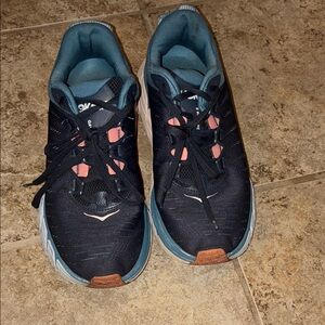 Hoka Black and Teal Running Shoes with Pink Highlights
